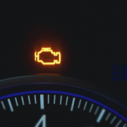 auto instrument panel showing check engine light